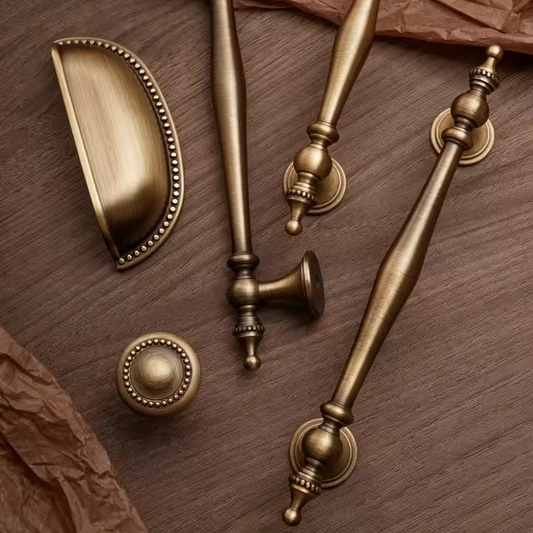 ROSENDALE antique brass cup pull hero shot on white background, vintage-style drawer cabinet hardware
