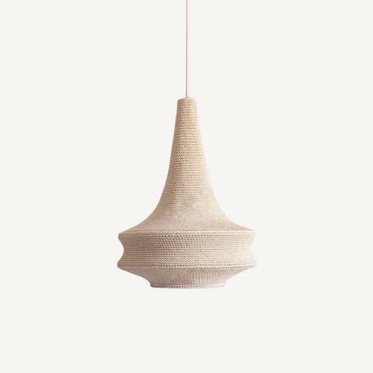 INÈS wool pendant lamp styled in a cosy dining space highlighting handcrafted natural fibre shade texture