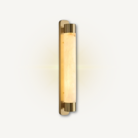 ADRIAN marble wall sconce angled view showing stone grain and brass fixture