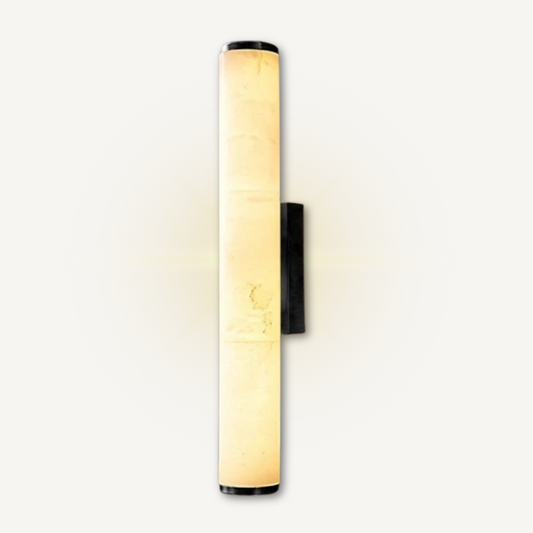 Lorenzo marble wall sconce angled view showing cylindrical shade and polished brass mount