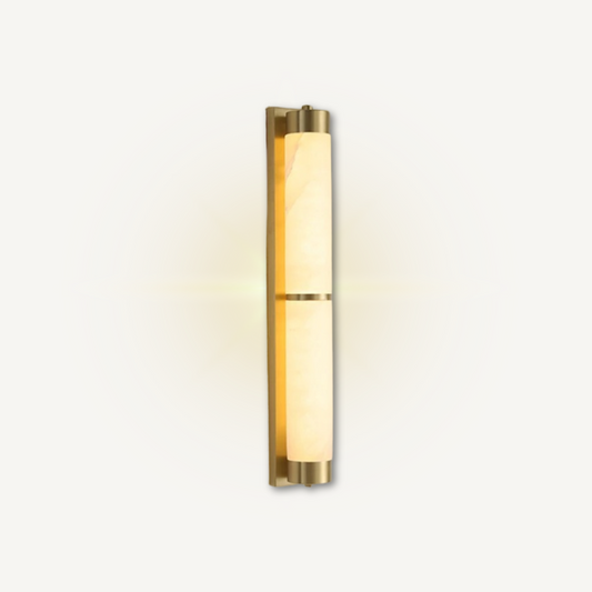 Marble sconce angled view showing natural stone shade and brass stem detail