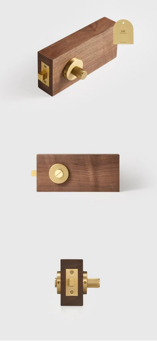 Angle view of STERLING 65mm brass thumb turn lock showing smooth rotating cylinder and backplate detail