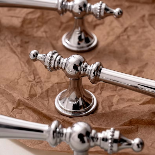 RAIN chrome cabinet wardrobe pulls photographed at an angle to highlight the polished chrome surface