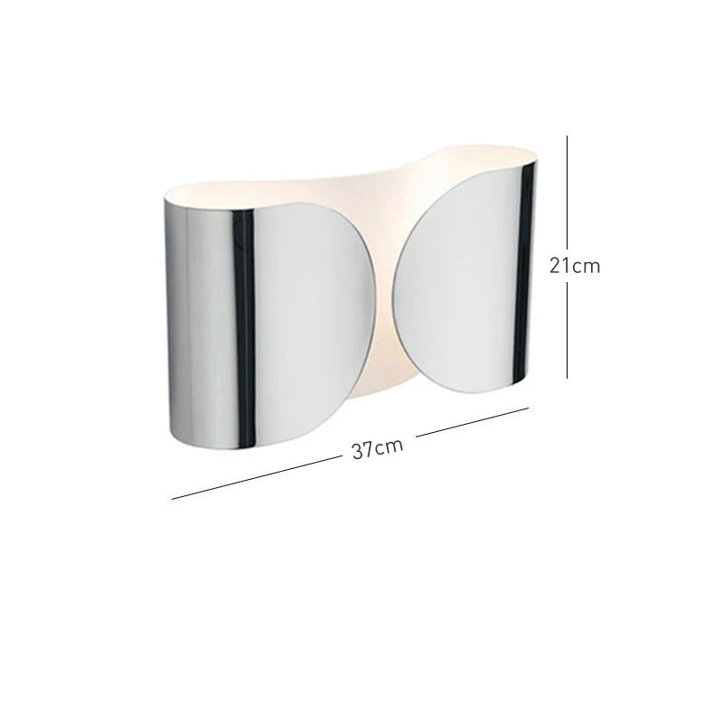 RENÉ wall light close-up showing chrome finish and adjustable arm detail, dining room lighting option