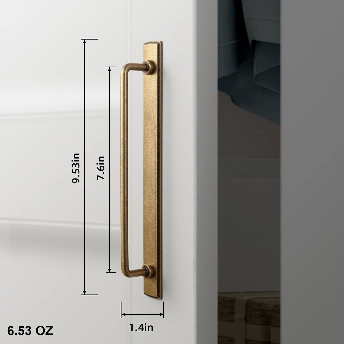 Lifestyle shot of TONI antique brass handles with backboard on a row of linen-fronted fitted wardrobe doors