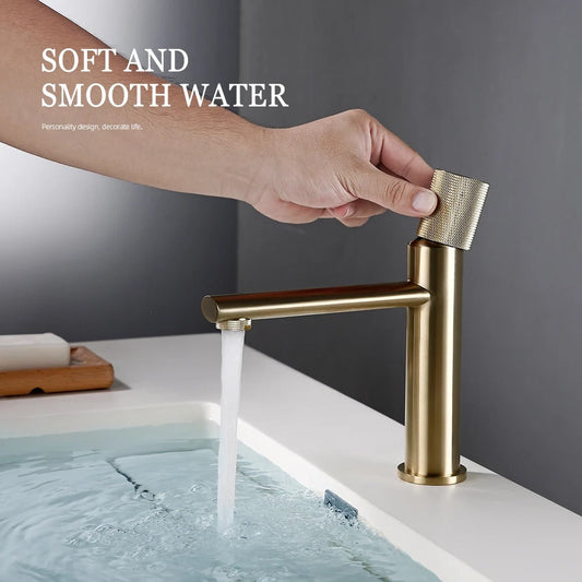 Gold knurled basin faucet side profile showing lever handle and spout curvature