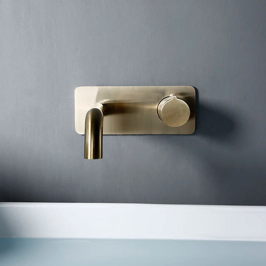 OLIVER brushed gold wall-mount basin faucet photographed from a side angle to show spout projection