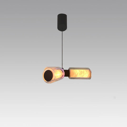 Marble and glass pendant light angled view revealing the stone base and globe shade