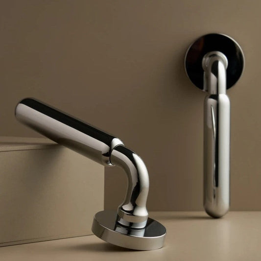 Livorno chrome door lever handle close-up showing architectural design