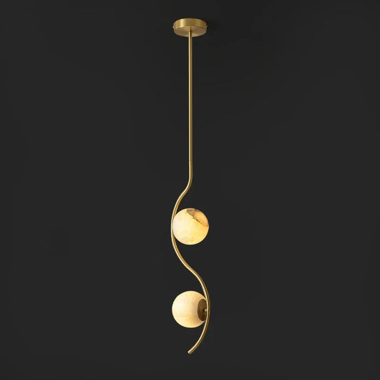 Esteban marble pendant angled to reveal the tapered shade profile and warm translucent stone quality