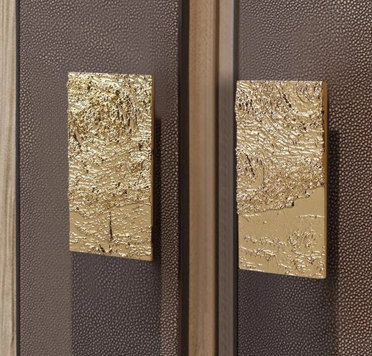 SIDNEY antique brass door handle angled view showing rectangular profile and warm patina finish