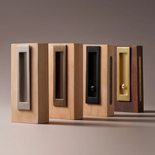 Integrated pocket door handle close-up showing flush mount and tactile grip in antique brass