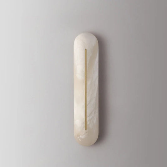 Giulietta marble wall lamp angled view showing the natural stone shade and gold wall bracket detail