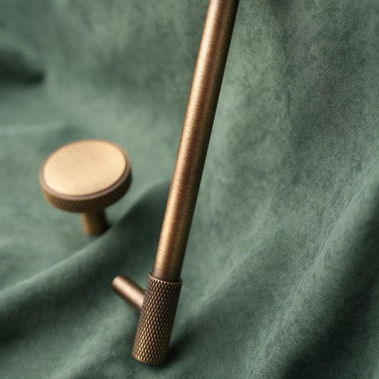 ROAN knurled cabinet knob angled view highlighting the cross-knurl texture and warm bronze patina