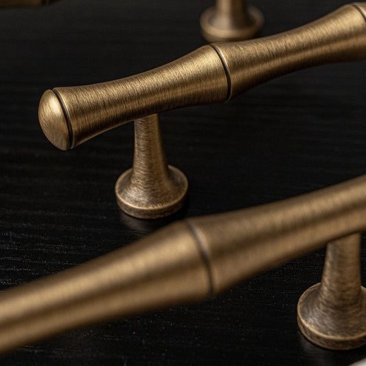 Angle view of WYKE bamboo T-bar showing distinctive T-shaped profile and smooth natural bamboo grain surface