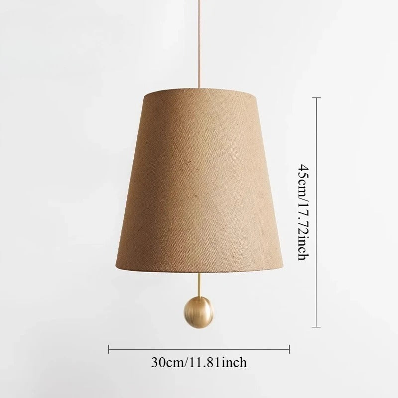 Detail of MARGAUX linen pendant lamp showing fabric weave and antique brass canopy and cable