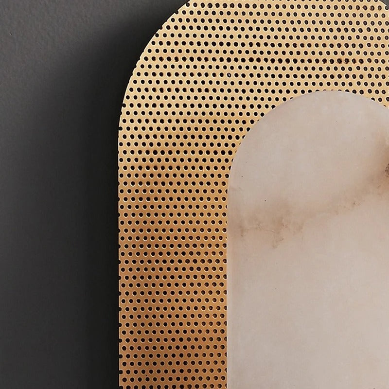 Close-up detail of Marcello copper marble linear wall lamp showing brushed copper arms and marble cap