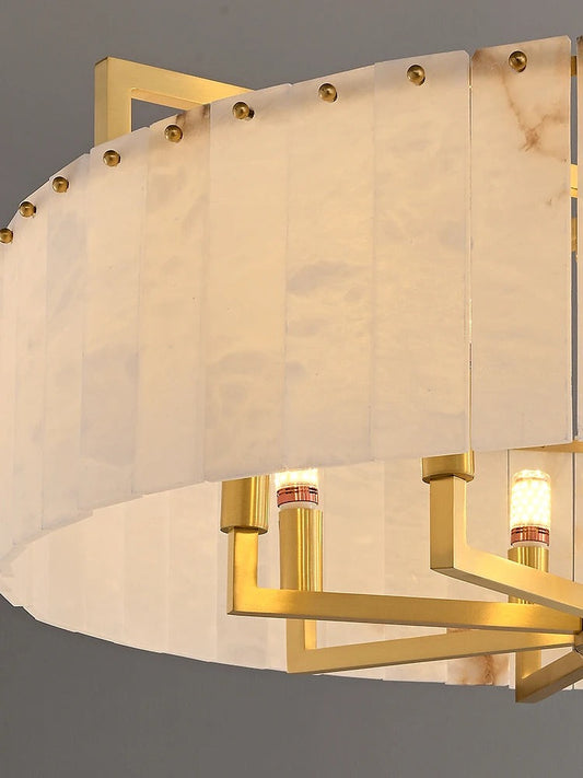 Bastien round marble pendant light side-angle showing brass ceiling rose and globe shade
