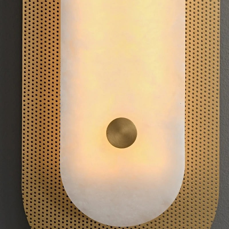 Detail of Marcello copper marble round wall lamp showing stone grain pattern and brushed copper finish