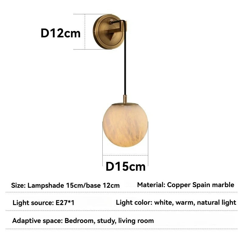 Aurélia wall lamp styled in a dining room with warm ambient light from alabaster shade