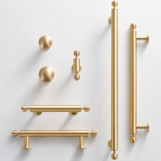 Avon solid brass knob top-down view showing domed profile and decorative collar