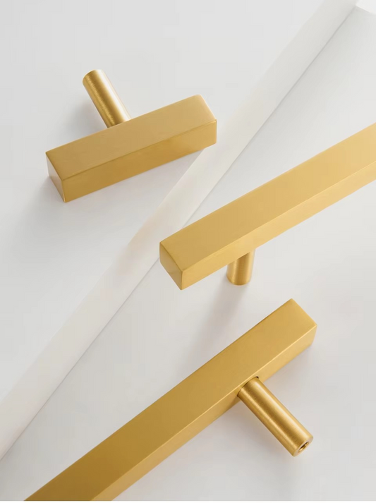 Solid brass square pull handle angled view showing clean geometric profile and brushed brass finish