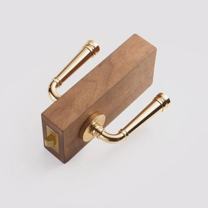 AURELIA lever handle styled in refined master bathroom with gold architectural hardware