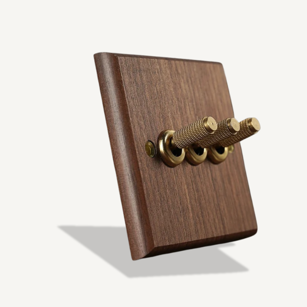 Solid walnut wood 3-gang wall switch with vintage brass lever for heritage interior