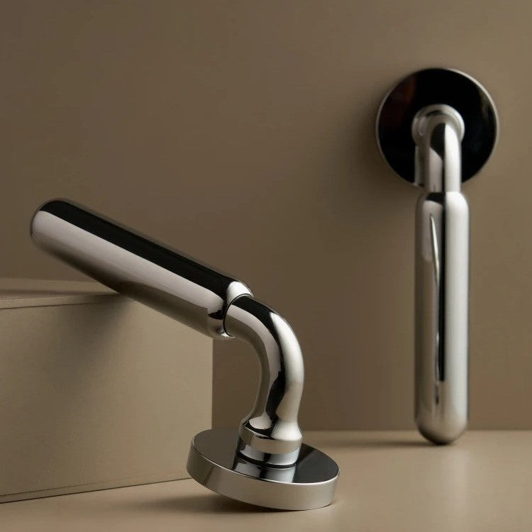Livorno chrome door lever handle close-up showing architectural design