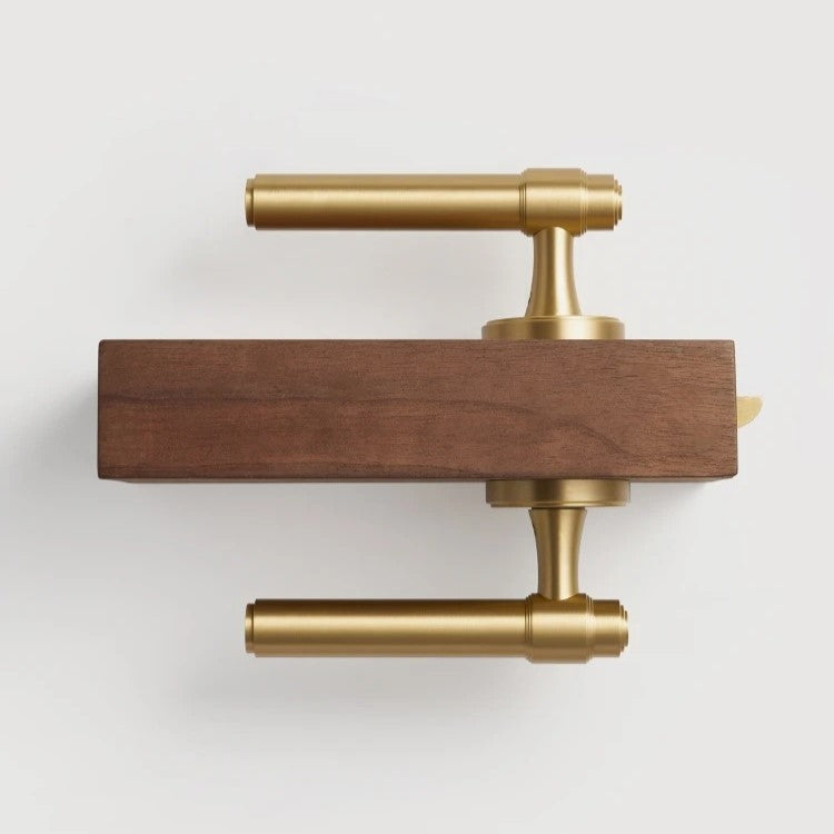Detail of backplate and spindle on LUCCA antique brass architectural door lever set