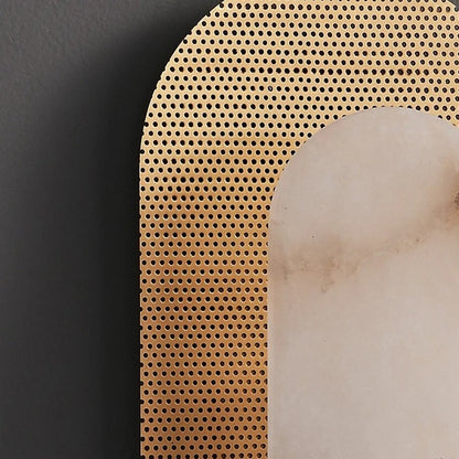 Close-up of MARCELLO copper marble wall lamp showing rich veining in the stone and aged copper bracket