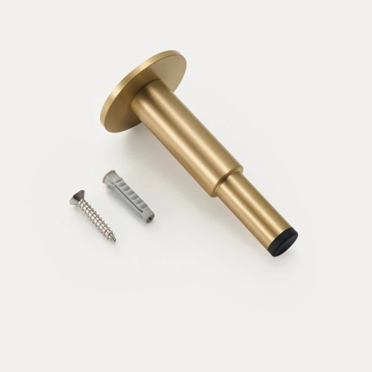 Detail of MODENA plain brass door bumper — corrosion-resistant anti-collision stopper